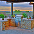 Exploring Popular Outdoor Kitchen Designs in Hardscape Construction